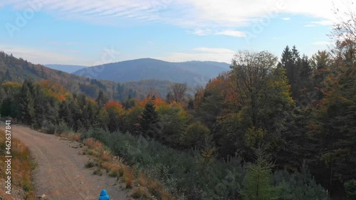 Beautiful aerial view of autumn in mountains. Lonely walk