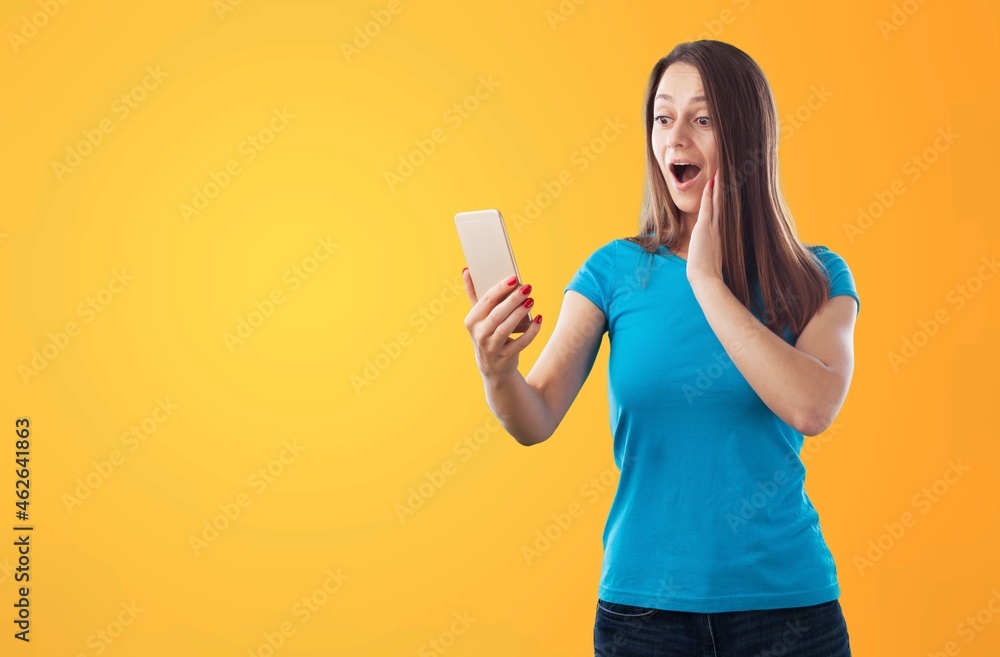 Excited Beautiful young women on a color background. Excited Beautiful young women on a color background.