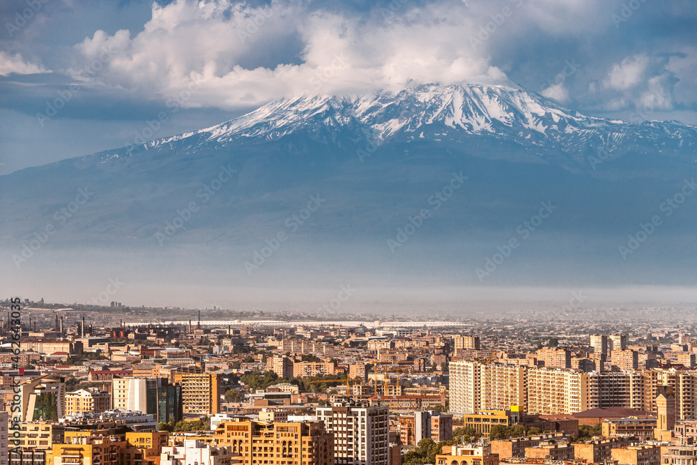 Spectacular telephoto zoom view of the city of Yerevan and Mount Ararat. The concept of real estate and construction investment in Armenia.