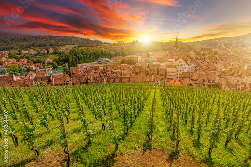 Scenic sunset on Schaffhausen with vineyard terraces by the Upper Rhine river. Aerial cityscape and countryside in Switzerland on Munot fortress in the canton Schaffhausen.