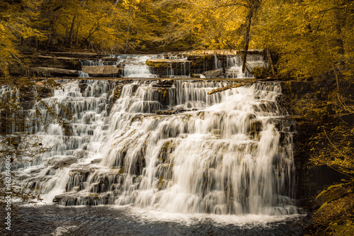 Waterfall surrounded by autumn colors