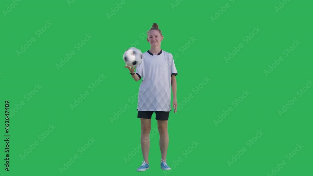 Girl soccer player performs tricks with the ball on a green screen background, Chroma Key. Young caucasian woman practicing football skills. 4K UHD slow motion RAW graded footage Girl soccer player performs tricks with the ball on a green screen background, Chroma Key. Young caucasian woman practicing football skills. 4K UHD slow motion RAW graded footage