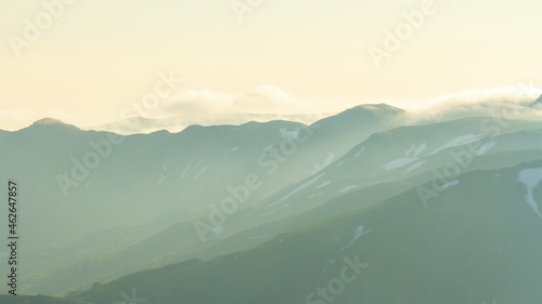 Fantastic foggy mountain background, morning in mountains © Victoria