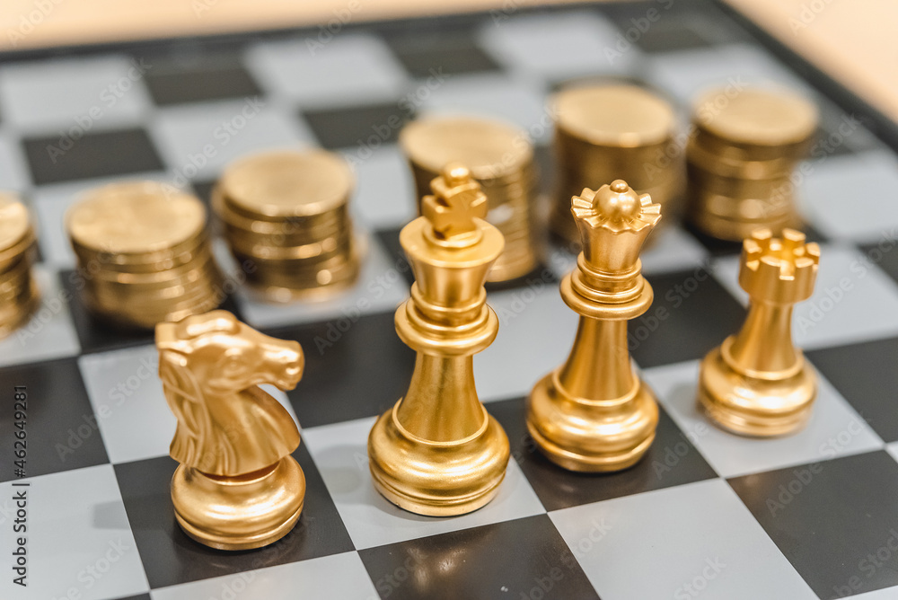 Chess board game to represent the business strategy with competition in the world market. and find out the best solution to meet target objective and goal. Sign and symbol of challenging as concept. Chess board game to represent the business strategy with competition in the world market. and find out the best solution to meet target objective and goal. Sign and symbol of challenging as concept.