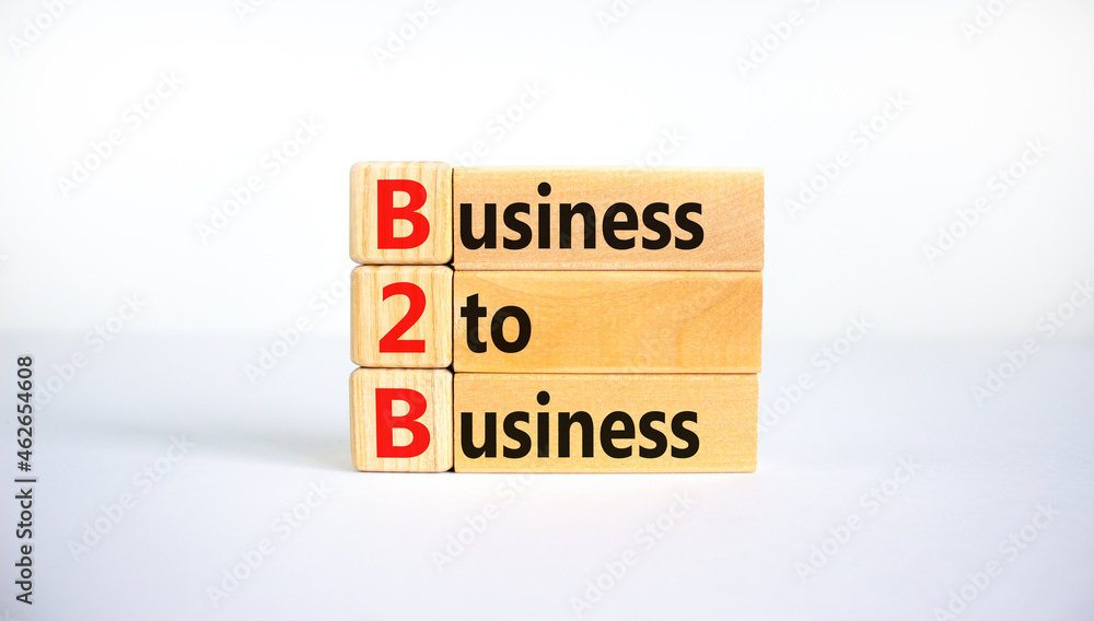 B2B business symbol. Concept words 'BBC - business to business' on wooden blocks on a beautiful white table, white background. Business and B2B concept. Copy space. B2B business symbol. Concept words 'BBC - business to business' on wooden blocks on a beautiful white table, white background. Business and B2B concept. Copy space.