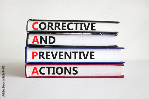 CAPA synbol. Concept words 'CAPA, corrective and preventive actions' on books on a beautiful white background. Business and CAPA, corrective and preventive actions concept. Copy space.