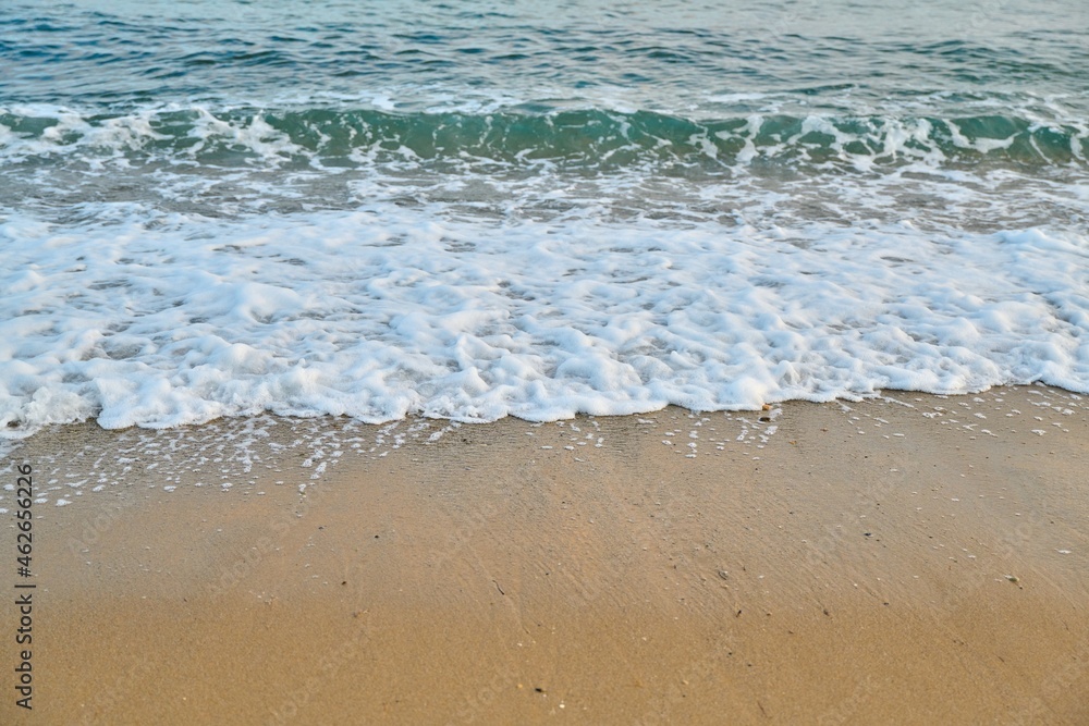 Seascape at sunrise, sea background, foam, sand, dawn. Seascape at sunrise, sea background, foam, sand, dawn.