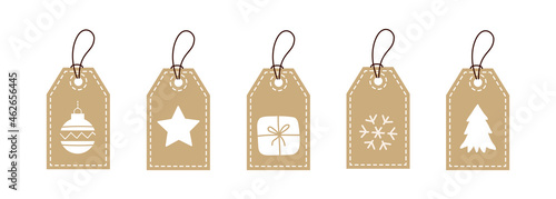 Set of kraft paper tags with white christmas elements isolated on a white background. Modern vector illustration