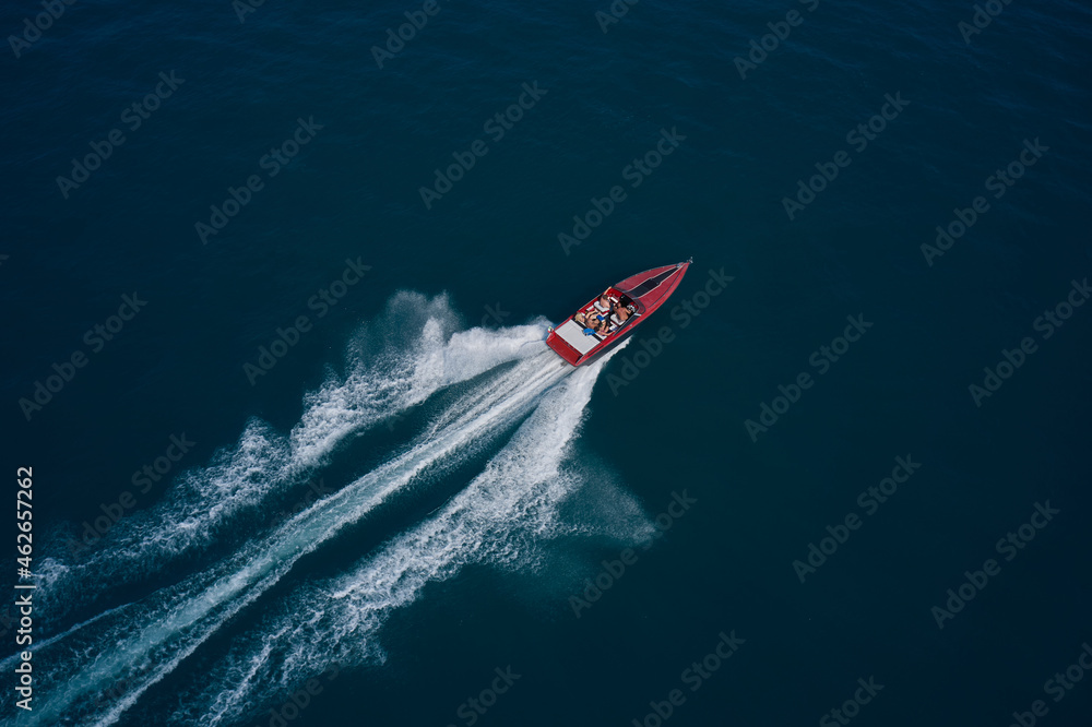 custom made wallpaper toronto digitalDiagonal boat movement on blue water top view. Red speed boat fast movement on the water top view. Travel - image. Top view of a red fast boat.