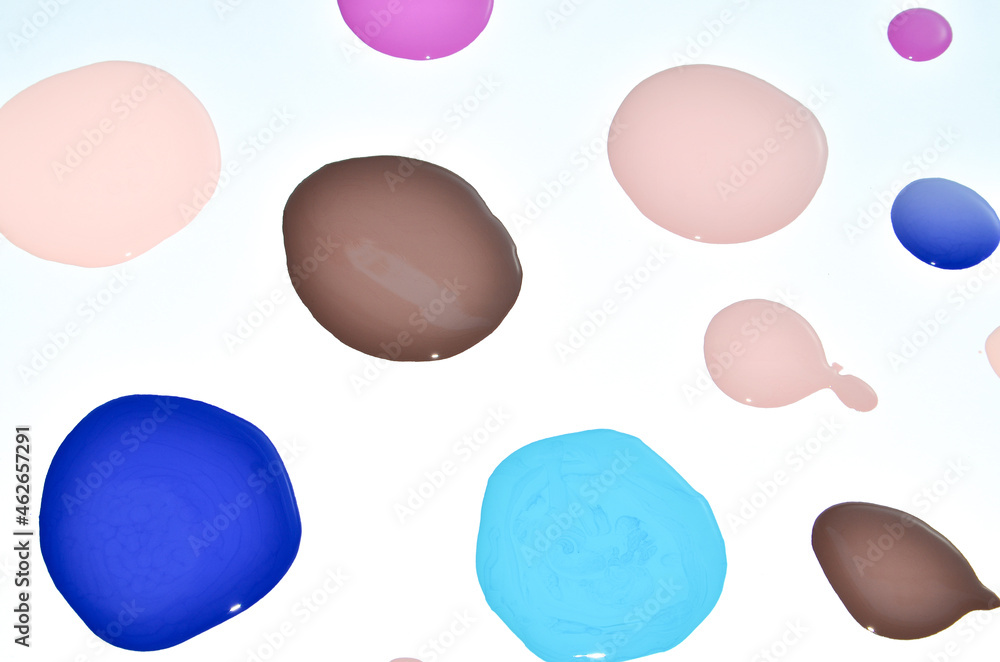 Nail polish (enamel) mixed multicolor samples, isolated on white background Nail polish (enamel) mixed multicolor samples, isolated on white background