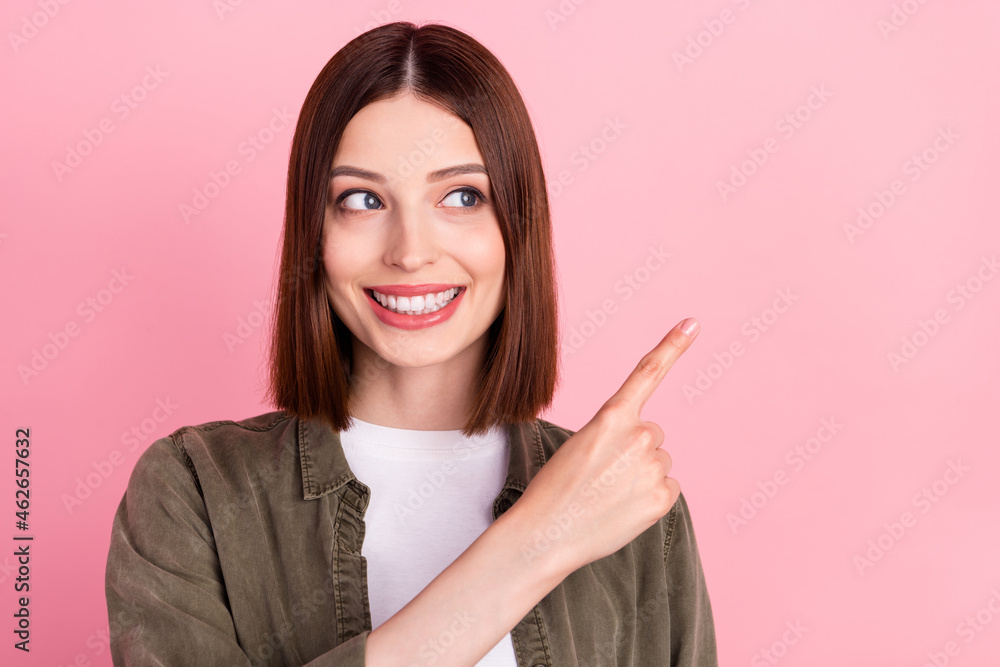 Photo of cunning bob hairdo young lady point look empty space wear jeans shirt isolated on pink color background Photo of cunning bob hairdo young lady point look empty space wear jeans shirt isolated on pink color background