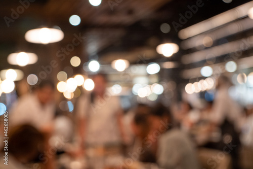 Blurred background of Customer at restaurant blur background with abstract bokeh light