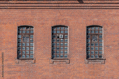 Old brick wall with windows background. Psychiatric hospital No. 3, the city of Novosibirsk 