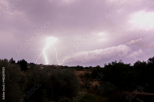 View of a thunderstorm over a village in Greece