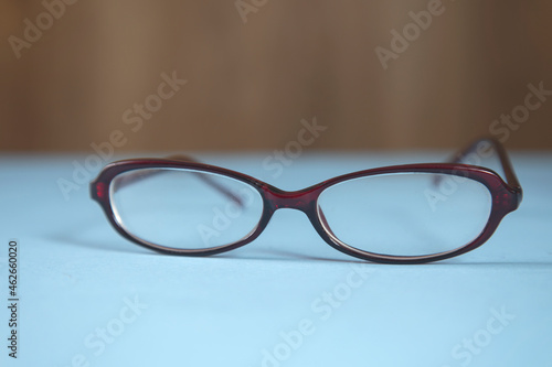 optic glasses on a blue background