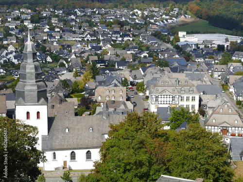 View of Eversberg, North Rhine-Westphalia, Germany, left the parish church of St. John the Evangelist photo