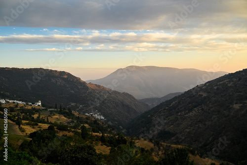 Scenic view from Capileira towards Bubión and Pampaneira in the beautiful Poqueira Valley at dusk, Las Alpujarras, Sierra Nevada National Park, Andalusia, Spain
