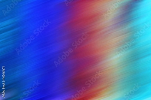 Abstract rainbow background in cool tones. Unfocused diagonal lines.