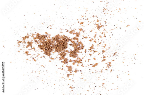 Close up pile ground, milled nutmeg powder isolated on white background, top view 
