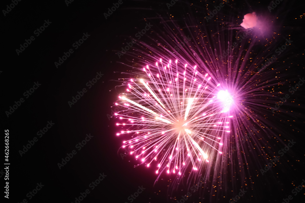 Beautiful bright fireworks lighting up night sky Beautiful bright fireworks lighting up night sky