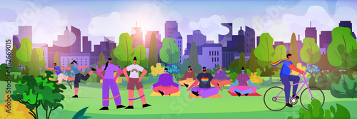 people doing physical exercises in urban park LGBT parade pride festival transgender love concept