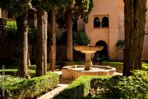 Daraxa's Garden (Jardines de Daraxa, Jardín de los Naranjos) with its big central marble fountain, Nasrid palaces, Alhambra de Granada UNESCO World Heritage Site, Andalusia, Spain photo