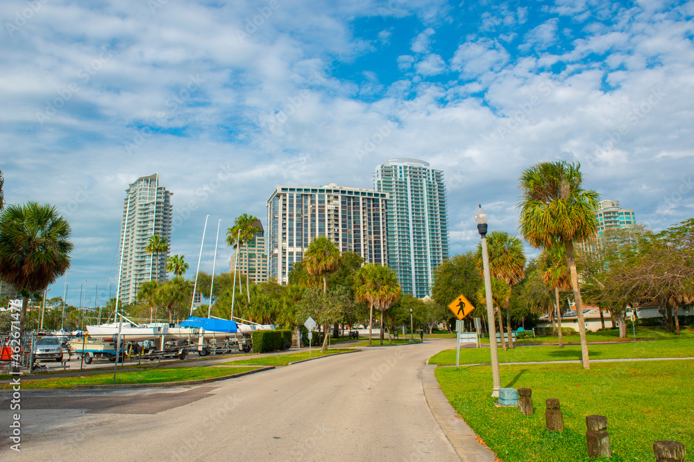 Modern city skyline including Signature Place, Bayfront Tower and One St. Petersburg from Demens Landing Park in downtown St. Petersburg, Florida FL, USA. Modern city skyline including Signature Place, Bayfront Tower and One St. Petersburg from Demens Landing Park in downtown St. Petersburg, Florida FL, USA.
