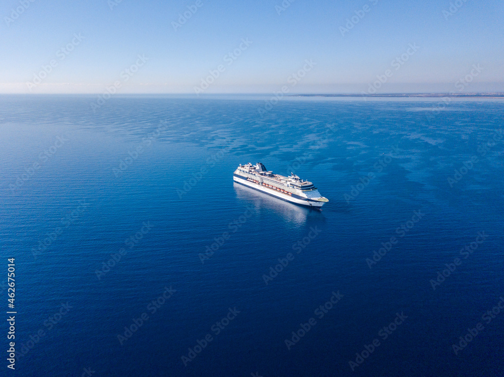 Aerial view on cruise liner in the blue sea Aerial view on cruise liner in the blue sea
