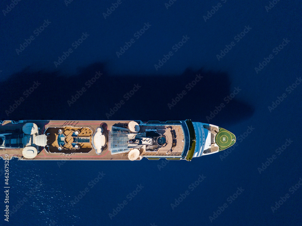 Top view from drone on luxury cruise ship in the blue sea Top view from drone on luxury cruise ship in the blue sea