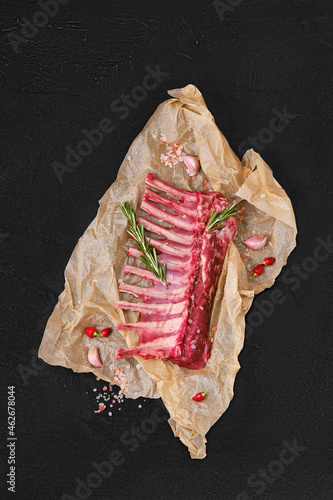 Top view of rack of lamb in wrapping paper photo