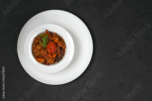 Overhead view of lamb stew with tomato