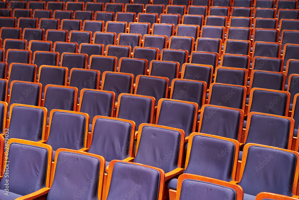 chairs in an empty concert hall chairs in an empty concert hall