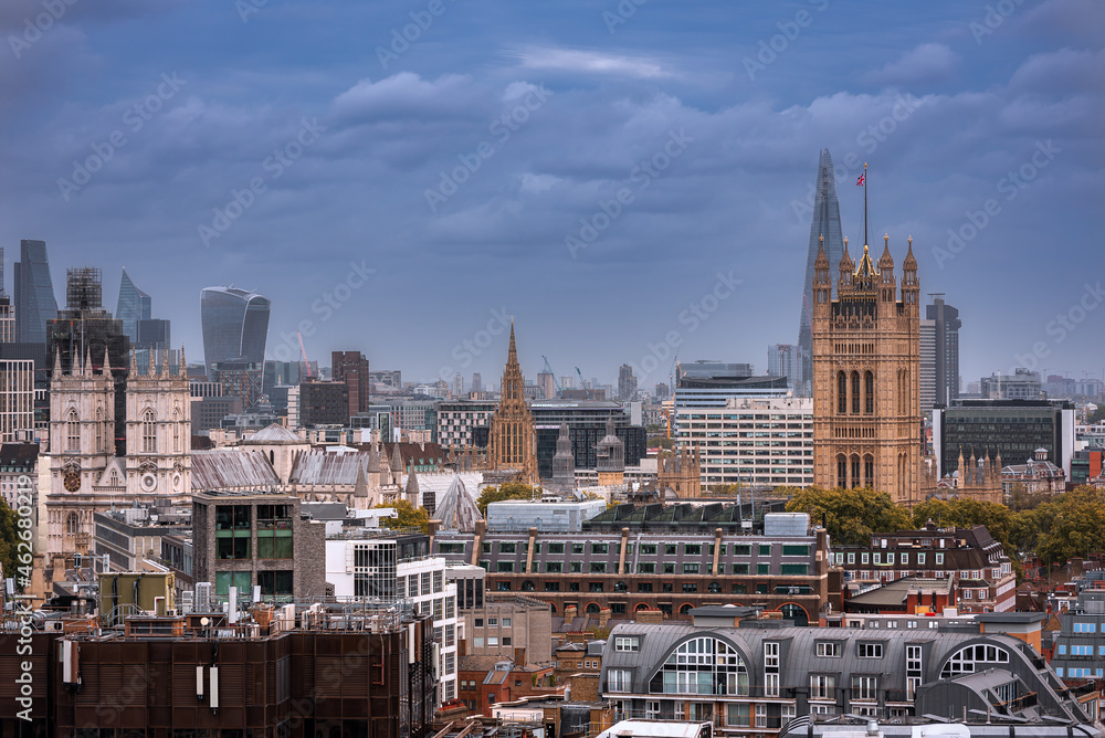 London cityscape with a bunch of famous buildings on it on an autumn overcast day