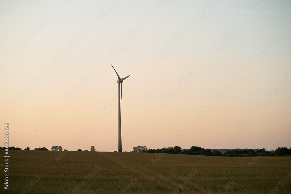 Wind turbine farm in the rural area in Poland. Renewable energy in the Europe Wind turbine farm in the rural area in Poland. Renewable energy in the Europe