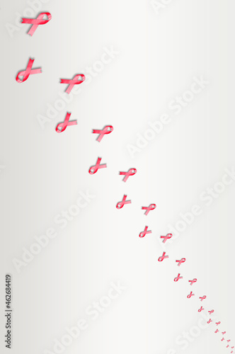 Small red ribbons on grey background representing World AIDS day