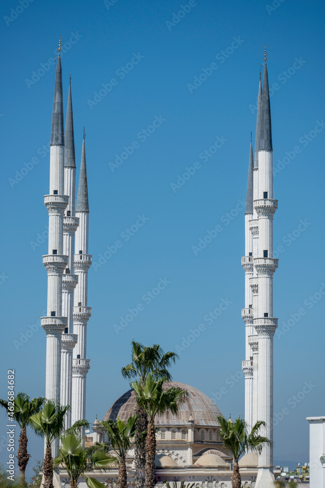 Stunning view of the Mersin Mosque with its six twin white minarets