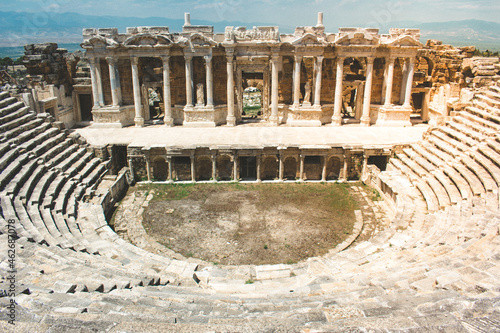The ancient city of Hierapolis in Pamukkale. The ancient theater of Hierapolis, thousands of years old. Great theater structure in the ancient city.