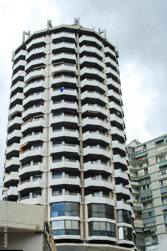 Fototapeta premium Colossal building in Benidorm city under cloudy sky