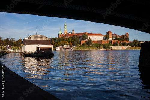 Poland, Krakow, view to Wawel Castle from under the bridge on Vistula River photo