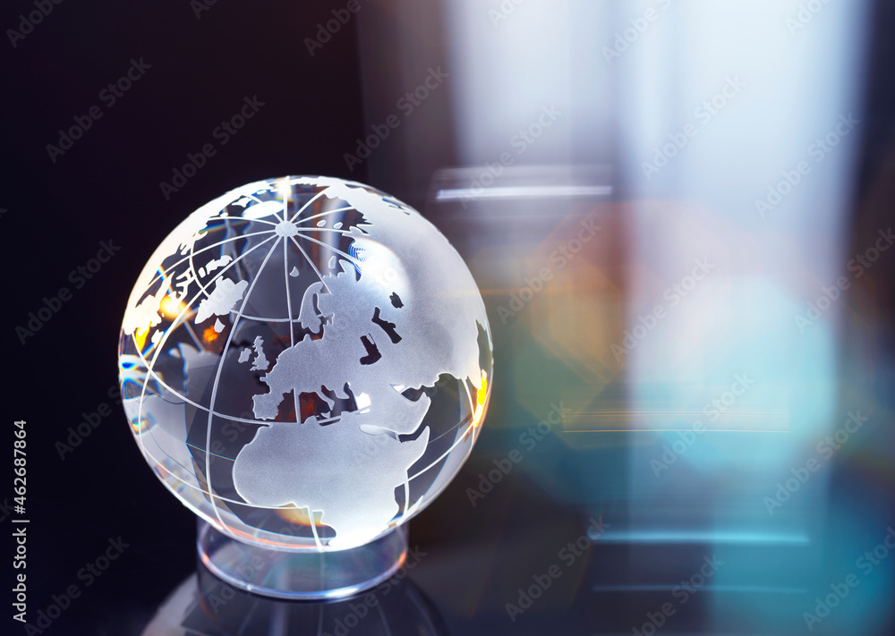 Glass globe representing international business and trade Glass globe representing international business and trade