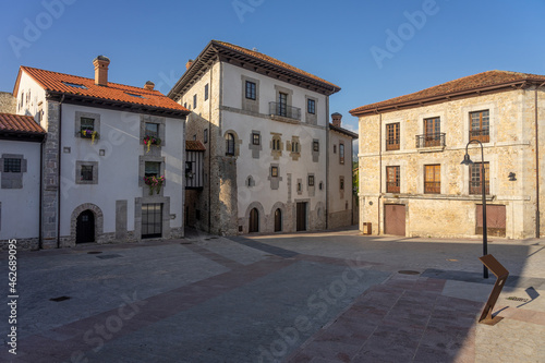 Santa Ana square in the old town of the beautiful village of Llanes in north of Spain at sunrise. © JoseLuis