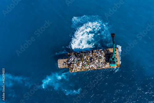 Maledives, South-Male-Atoll, plastic waste disposal with digger from above photo