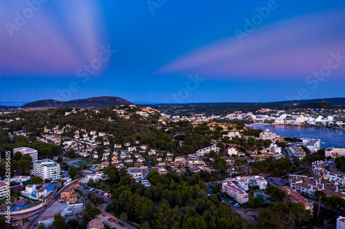 Spain, Balearic Islands, Mallorca, Calvia region, Aerial view over Costa de la Calma and Santa Ponca with hotels and beaches at sunset
