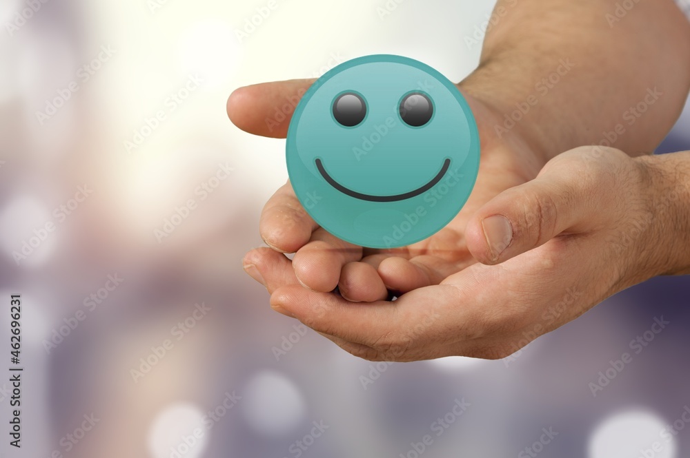 Hands holding happy smile face, good feedback rating and positive customer review, Hands holding happy smile face, good feedback rating and positive customer review,