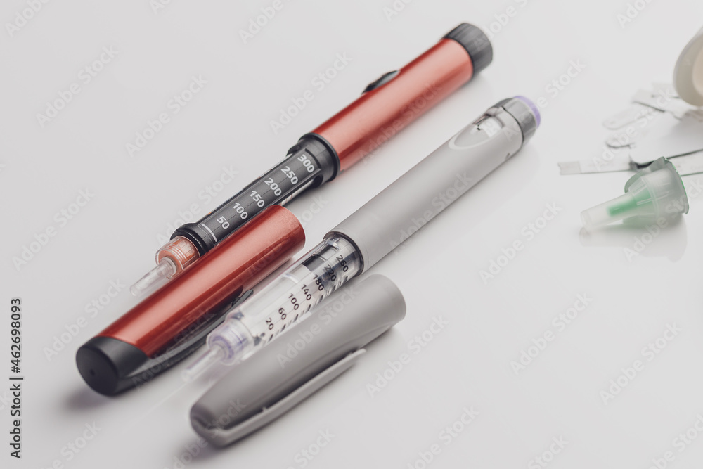 Medicine, diabetes, glycemia, healthcare and people concept. Insulin and blood sugar meter, diabetes kit . World Diabetes day, 14 November Medicine, diabetes, glycemia, healthcare and people concept. Insulin and blood sugar meter, diabetes kit . World Diabetes day, 14 November
