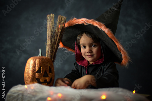 young child dressed as a wizard ifor halloween photo