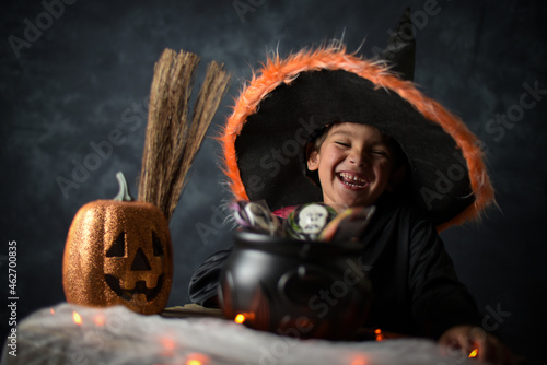 young child dressed as a wizard ifor halloween photo