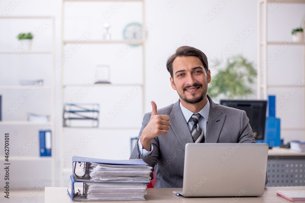 Young businessman employee working in the office