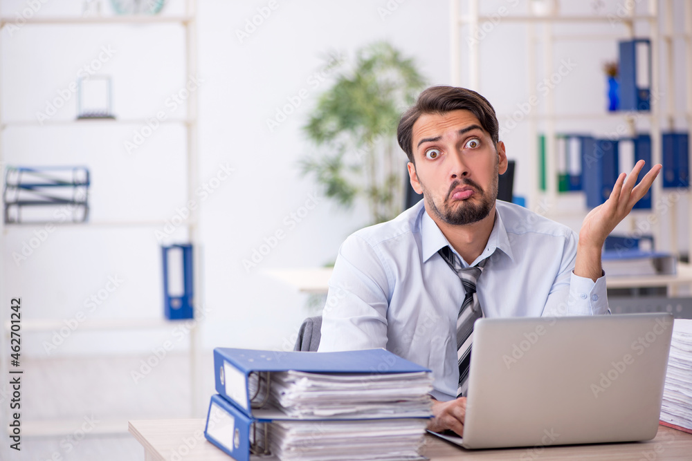 Young businessman employee working in the office Young businessman employee working in the office