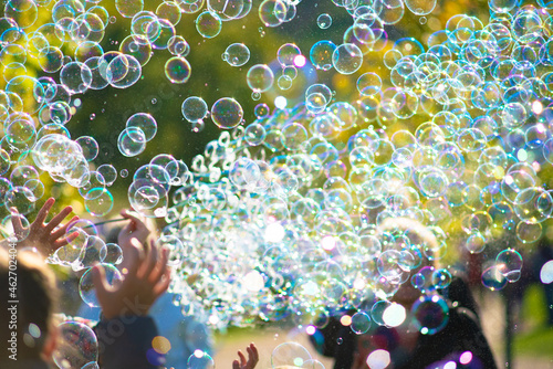 Foto Children's street party with soap bubbles
